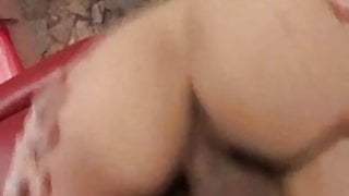 red head gets a good fuck on a red couch
