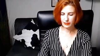Red head MILF stripping on webcam.